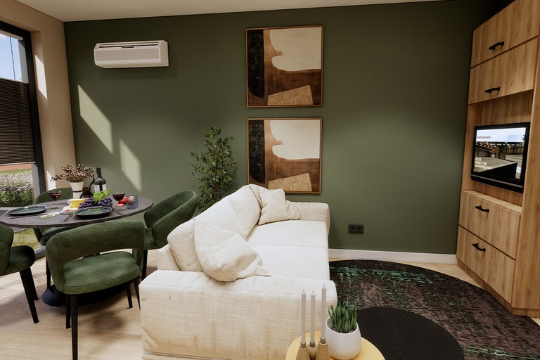 Woonkamer met bank, eettafel en tv-meubel