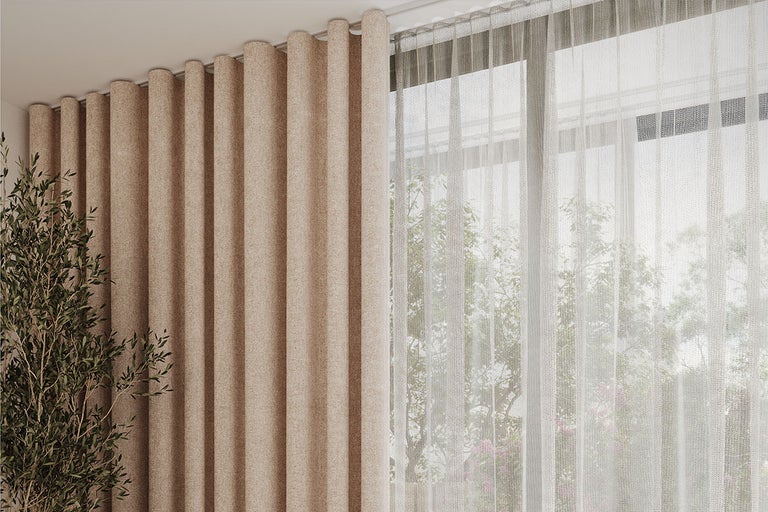 Kameroverzicht met gordijnen en overgordijnen voor raamdecoratie