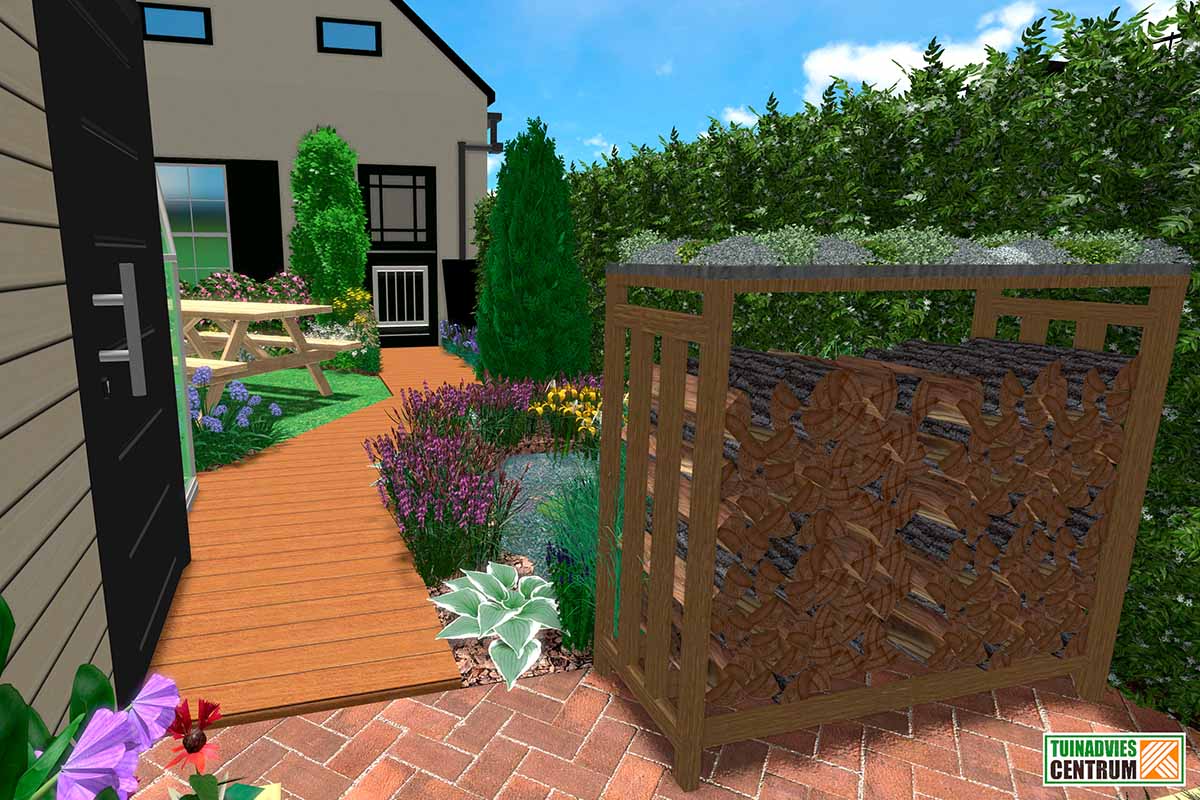 Tuinaanzicht met houtstapel, planten en picknicktafel