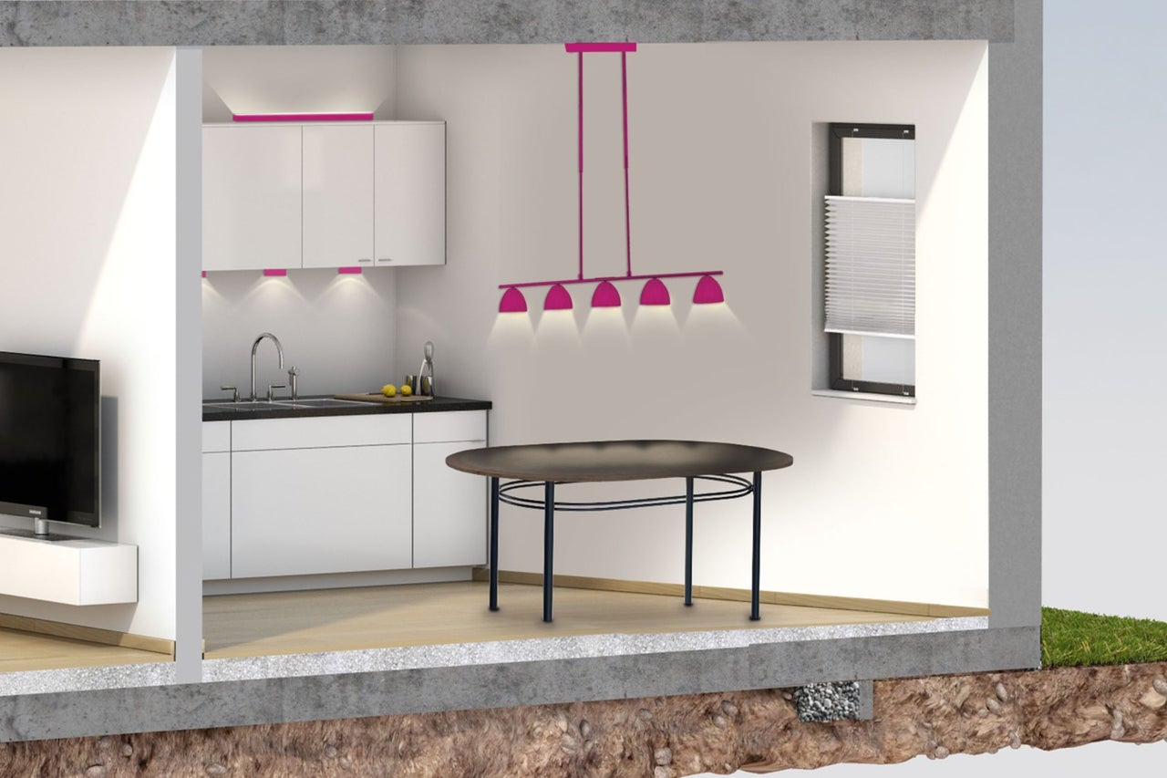 Interieurscène met woonkamer, keuken en eettafel