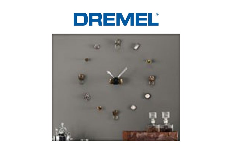 Dremel Logo en wandklok met diverse gereedschapskoppen als wijzerplaat