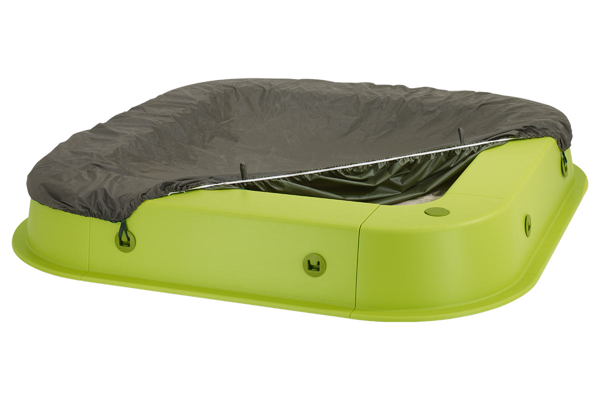 Groene zandbak met afdekking