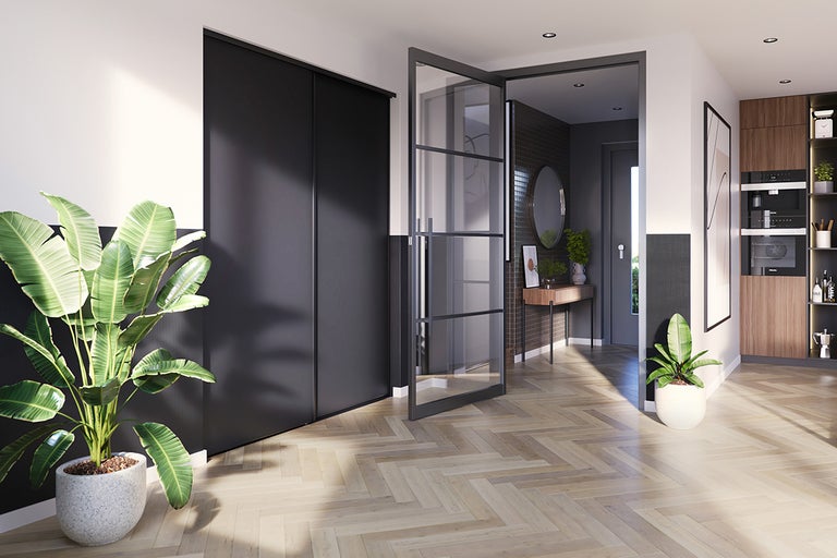 Moderne woonkamer met schuifdeur, glazen deur en visgraatparket