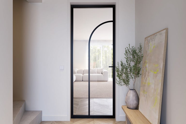 Kamerweergave met glazen deur met boog