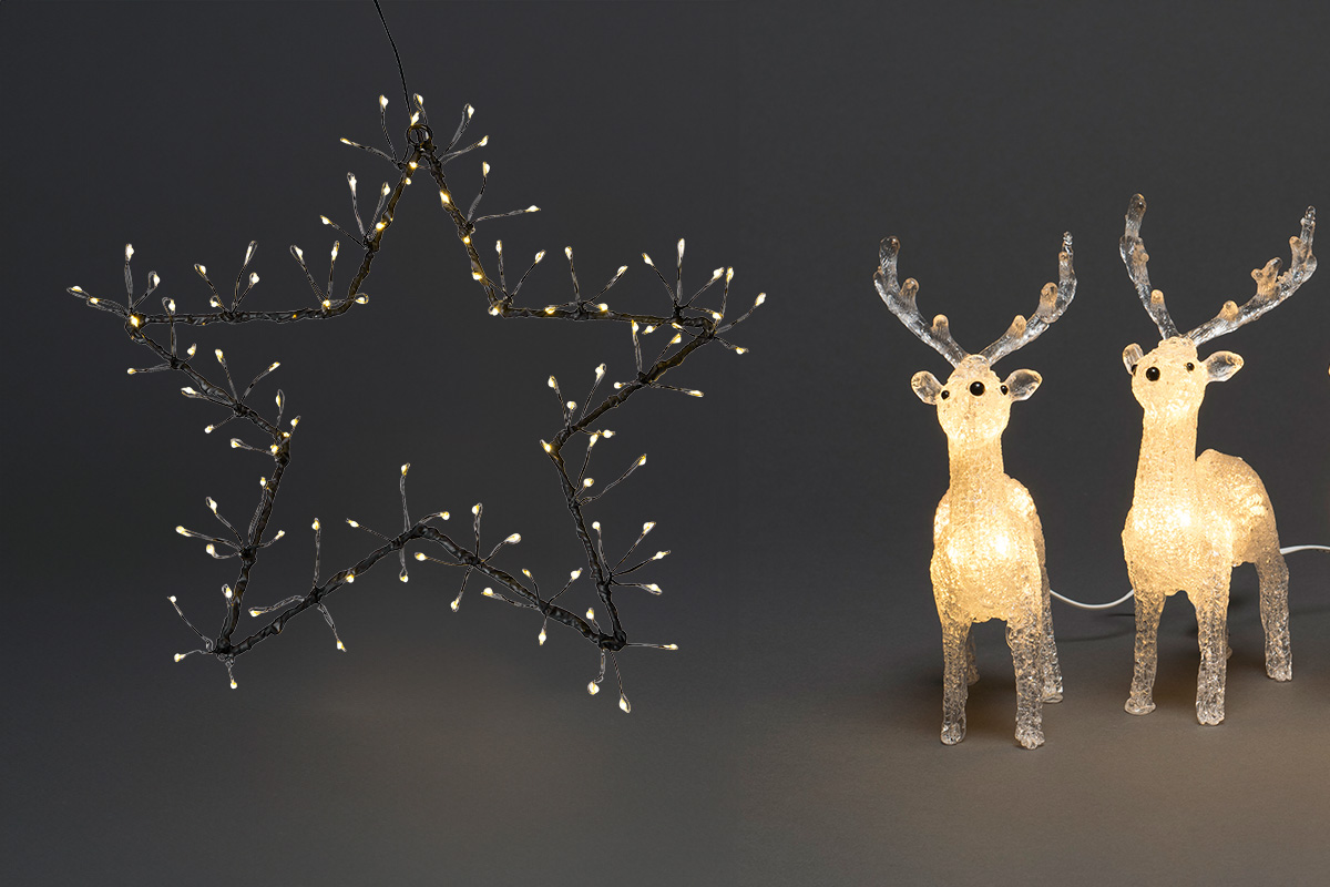 Decoratieve ster met ledverlichting en verlichte rendierfiguren