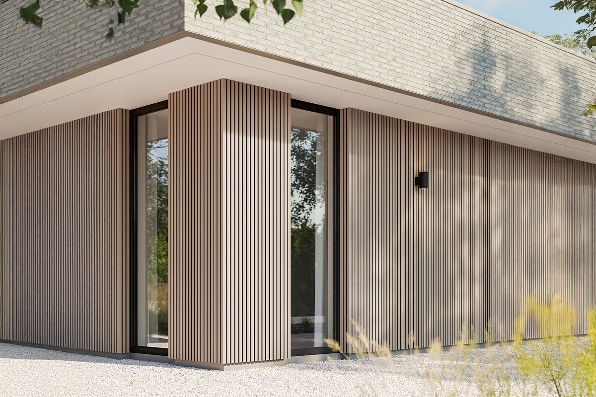 Gebouw met gevelbekleding, ramen en buitenlamp