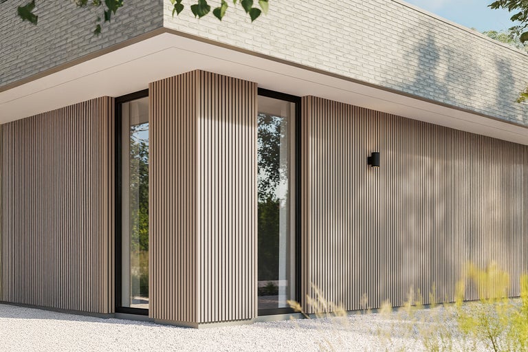 Gebouw met gevelbekleding, ramen en buitenlamp