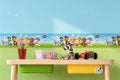 Behangrand met Paw Patrol motief voor de kinderkamer op een muur boven een kindertafel met speelgoed.