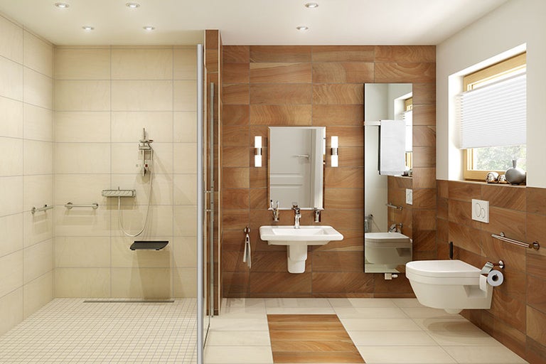 Toegankelijke badkamer met douche, wastafel en toilet