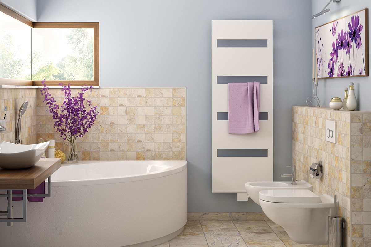 Badkamer met bad, wastafel, radiator en toilet in een licht ontwerp.