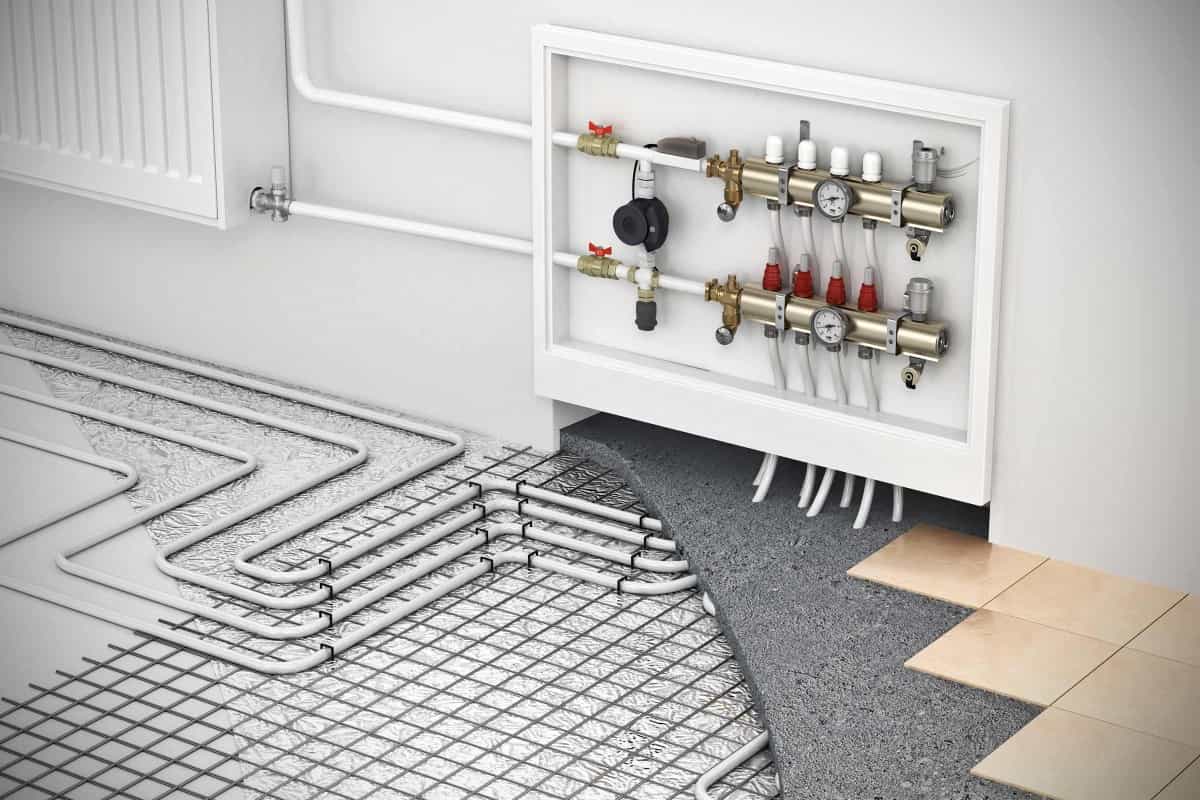 Illustratie van vloerverwarming met verdeler en verwarmingscircuits