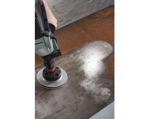 Schuurmachine in gebruik op een oppervlak