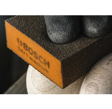 Schuurblok met Bosch logo op hout