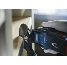 Multifunctioneel gereedschap in gebruik op een werkstuk