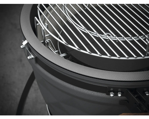 Gedetailleerde weergave van een bolvormige barbecue met grillrooster
