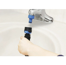 Waterkraan met slangkoppeling en tuinslang