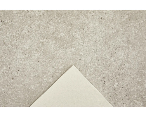 Close-up van een betonnen vloertegel met gespikkelde textuur