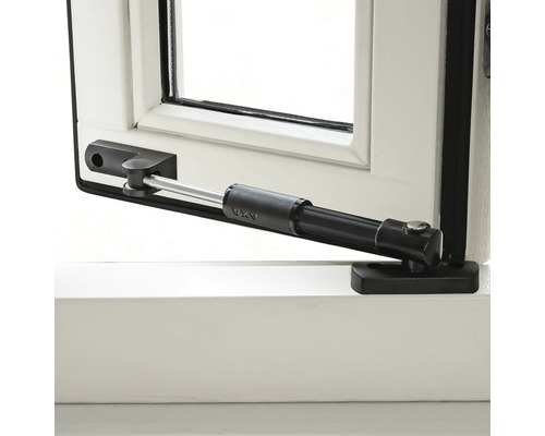 Raamuitzetter met zwarte behuizing gemonteerd op een raam