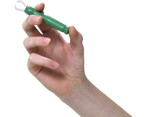 Hand houdt tekentang vast