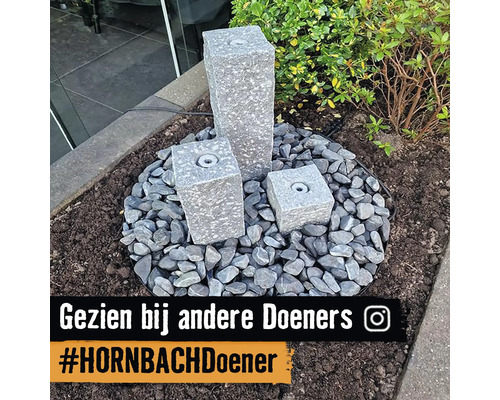 Tuinfontein van graniet met kiezels