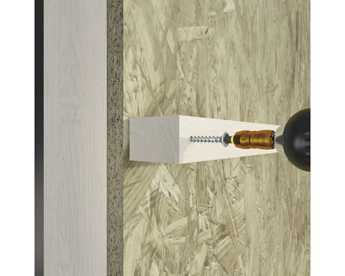 Bevestigen van een stuk hout met een schroef aan een wand met een schroevendraaier