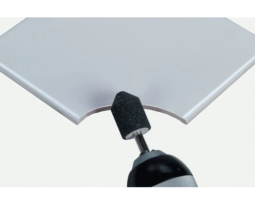 Boorkop bewerkt tegelrand