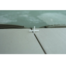 Tegelvoeg met tegelkruis