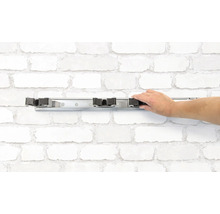 Wandhouder voor stelen met hand