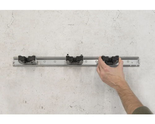 Wandhouder voor gereedschap met drie houders