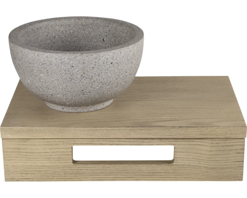 Decoratieve schaal van steen op een houten doos