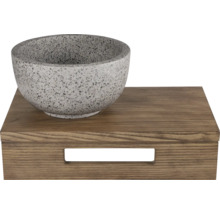 Decoratieve stenen schaal op een houten doos