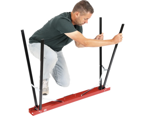 Man bedient een draaghulp voor gipsplaten