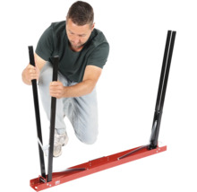 Man monteert een montagehulp voor autoglas.