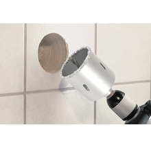 Diamantboor boort gat in tegel