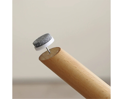 Viltglijder met spijker op een houten poot