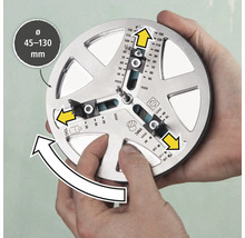 Een gereedschap voor het nauwkeurig aftekenen van boorgaten met een diameter van 45 tot 130 millimeter wordt door twee handen vastgehouden.