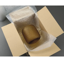 Bruine glazen vaas in een kartonnen doos met noppenfolie