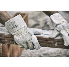 Gebol Worker lederen veiligheidshandschoenen tillen een baksteen