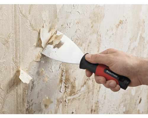 Rautner plamuurmes verwijdert oud behang van de wand. Handmatige spachtel met ergonomische handgreep en metalen blad.