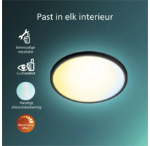 Ronde plafondlamp met zwarte rand. Kenmerken: eenvoudige installatie, EyeComfort, afstandsbediening en Warm Glow effect.