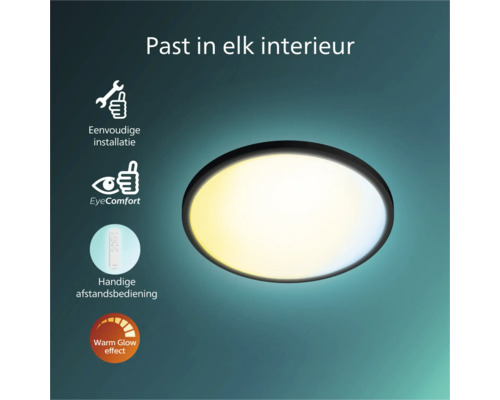 Ronde plafondlamp met zwarte rand. Kenmerken: eenvoudige installatie, EyeComfort, afstandsbediening en Warm Glow effect.