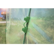 Groene folieclip voor het bevestigen van een kasfolie