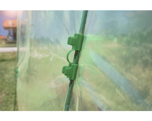 Groene folieclip voor het bevestigen van een kasfolie