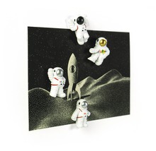Decoratieve magneten met ruimtethema en astronautfiguren