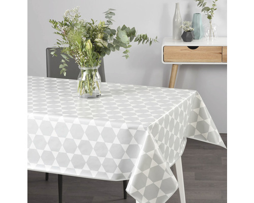 Tafel met tafelzeil met geometrisch patroon in de eetkamer