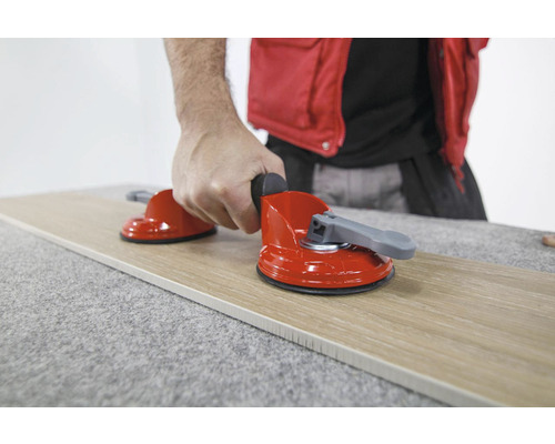 Tegelzuiger voor het optillen van een tegel