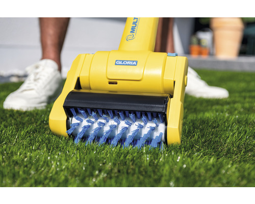 Gloria Logo. Gloria elektrische voegenborstel op gazon.