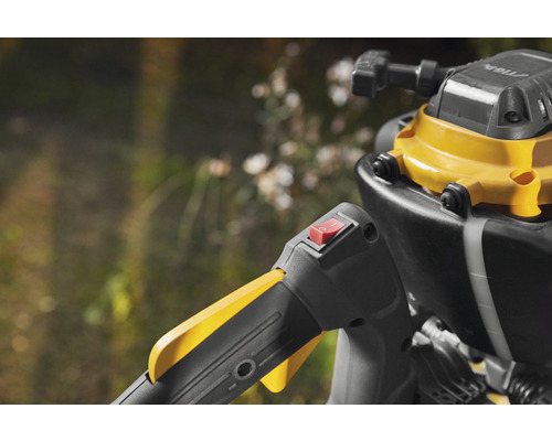 Detailopname van een trimmer met schakelaar en handgreep