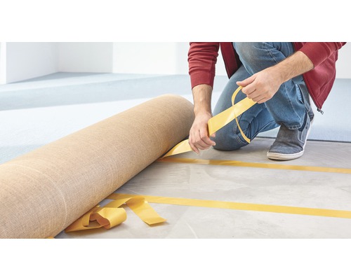 Rol tapijt wordt gelegd met dubbelzijdige tape