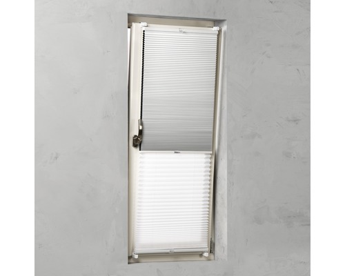 Plisségordijn op het raam voor lichtregulering en privacy